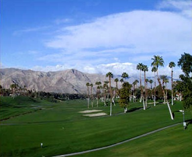 Picture of golf course with mountains behind